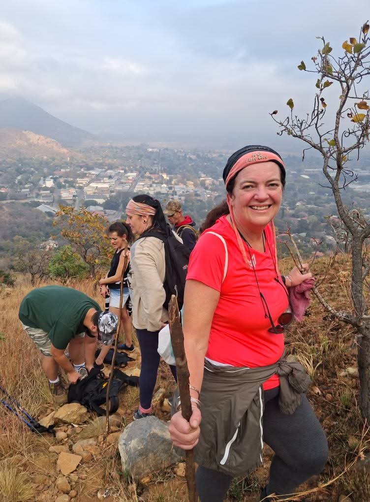 Smiling hiker above Barberton town on a guided day hike