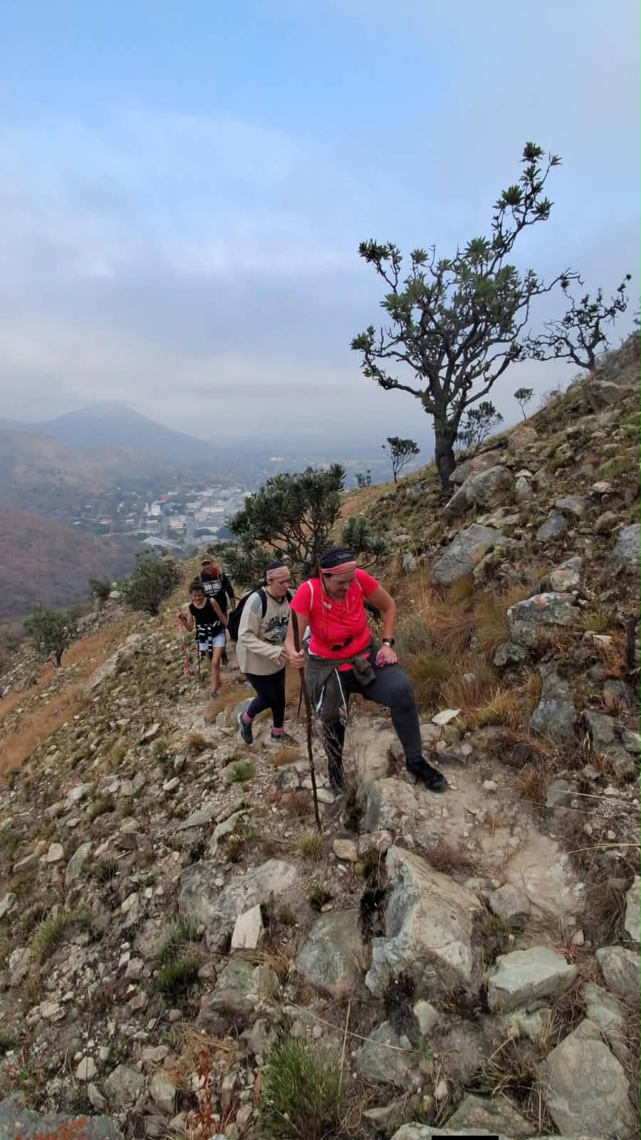 Hikers climbing the rocky Genesis Route above the town of Barberton